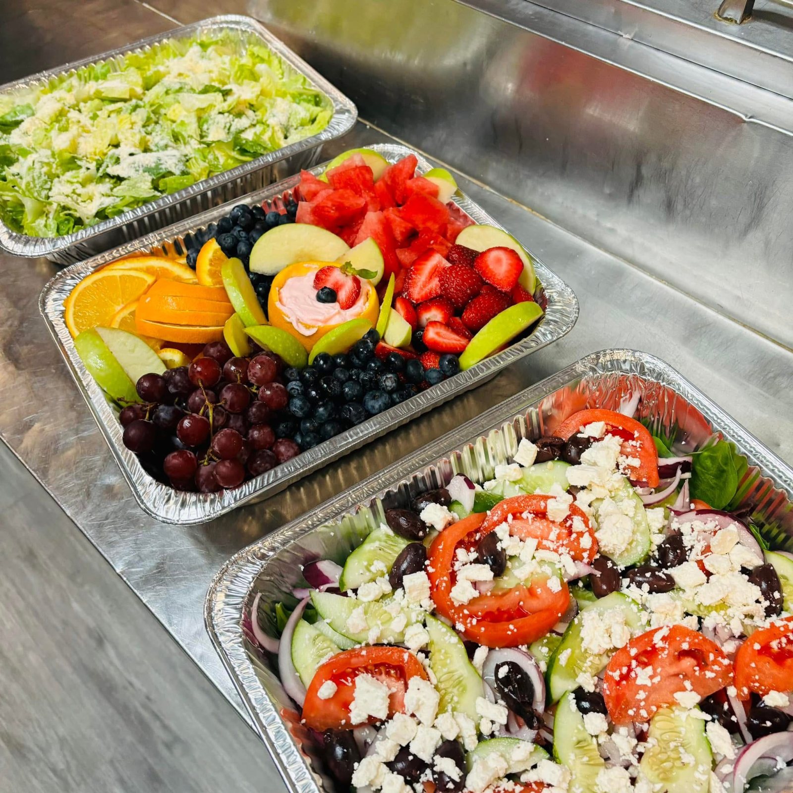 Fruit tray, Nana salad, cranberry walnut salad